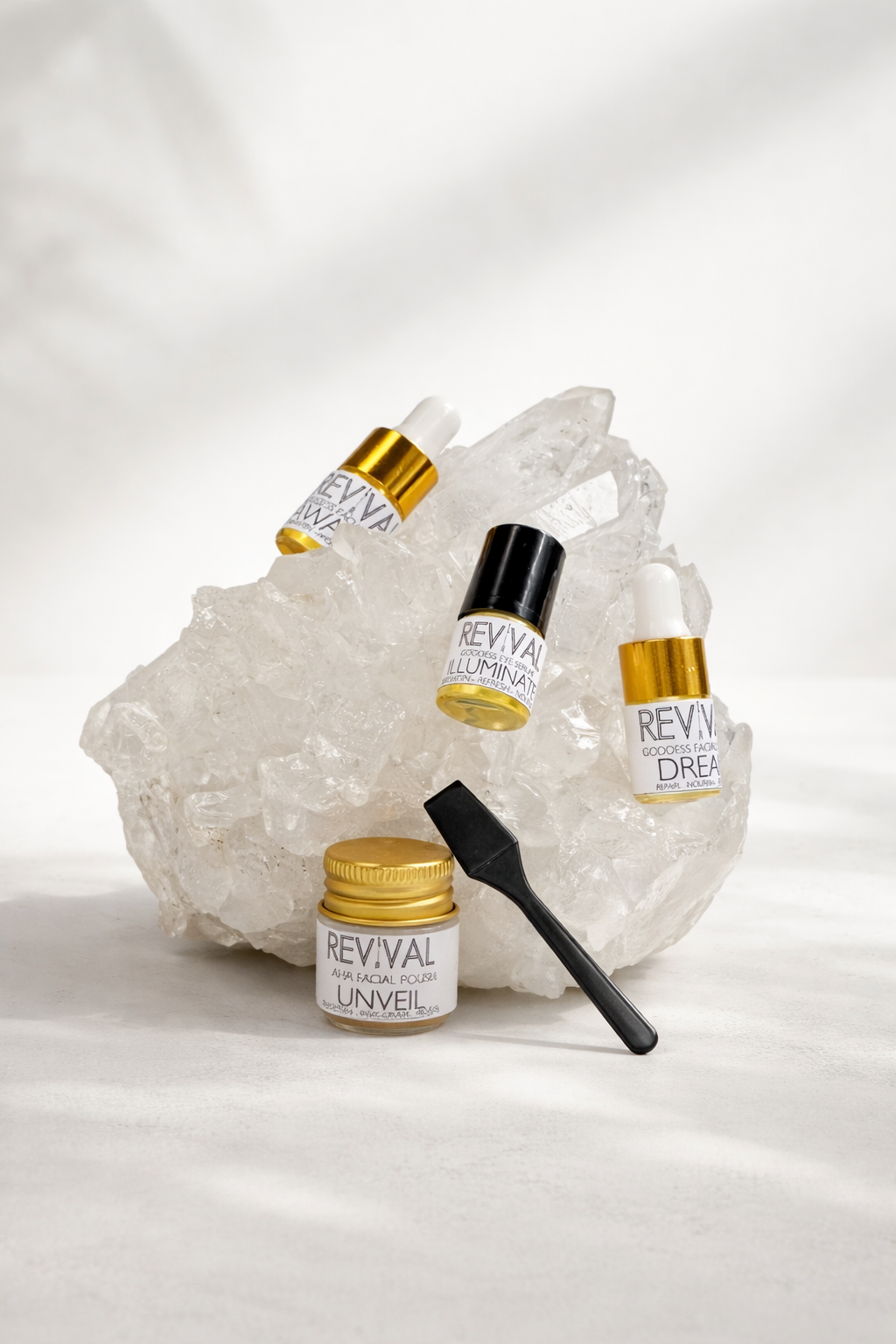 Mini serums with 'Revival' branding on a white background